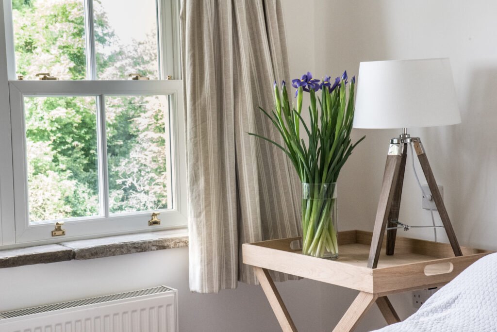 flowers on table with lamp