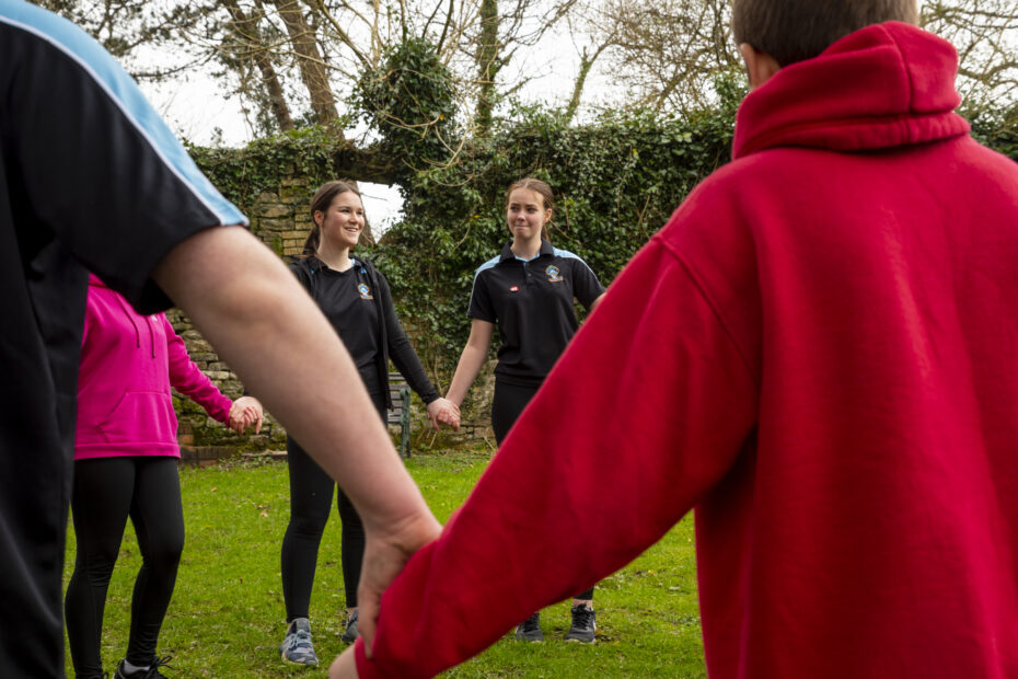 children playing team building games