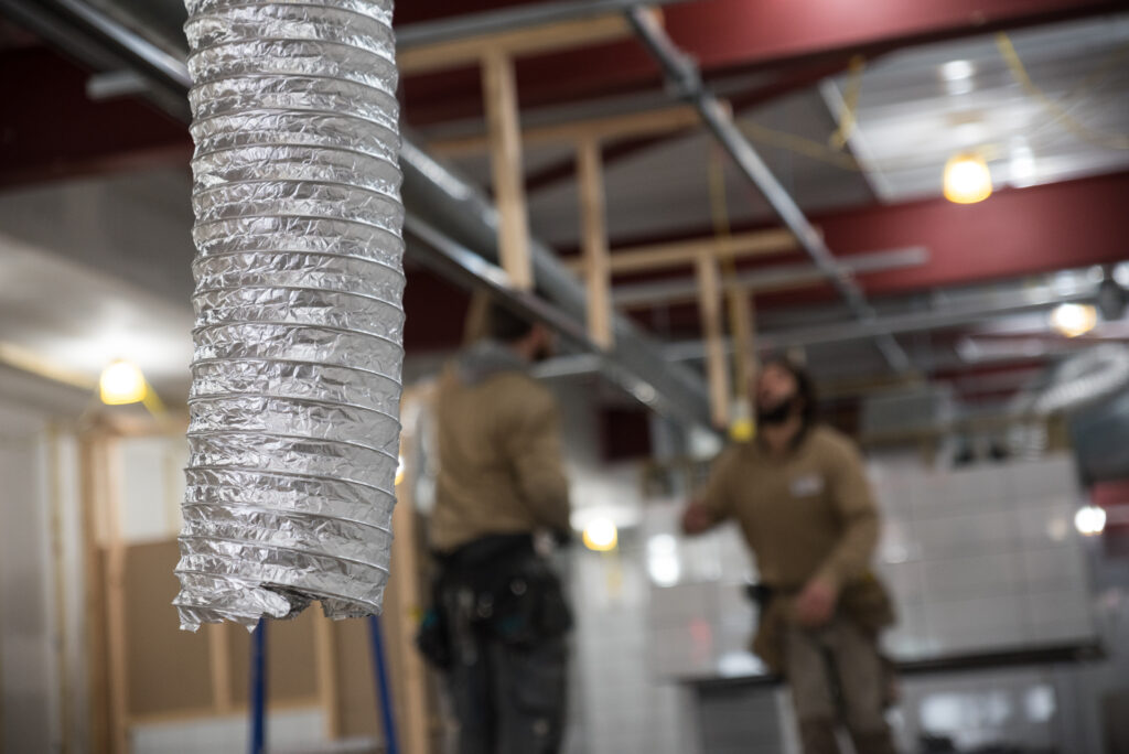 duct and workmen
